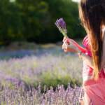 Brown-Haired-Girl-Standing-On-Windy-Lavender-Field