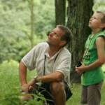 father-and-son-enjoy-a-leisurely-afternoon-of-birdwatching