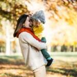 mother-and-son-in-autumn-park_1303-5385